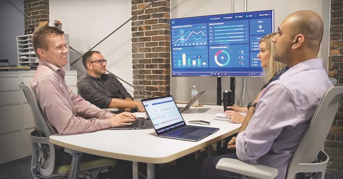 SPARK team creating and reviewing a business dashboard.